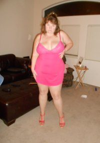 married redhead in pink nightie suntan crotchless pantyhose and my hooker heels3.JPG
