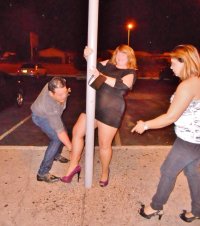 married redhead in my 'Hooker Minidress', suntan crotchless hose, no undies and my 'Hooker Hee...JPG