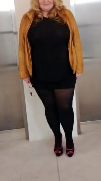 mwf redhead dressed for a night at the casino with my bull, waiting by the elevator at casino ...jpg