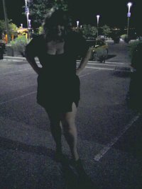 Married Redhead Black Minidress Nylons and Heels.jpg