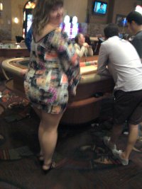 married redhead at a casino table.jpg