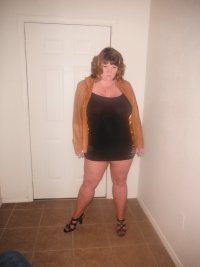 Married Redhead in my 'Hooker Minidress', Suntan Crotchless Nylons, Sans Bra and my 'Hooker He...JPG