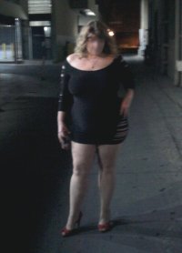 married redhead in my minidress, suntan crotchless hose, no bra and heels in a downtown alley ...jpg