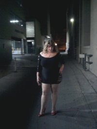 married redhead playing 'lady of the night'  in my minidress, suntan crotchless hose, sans bra...jpg