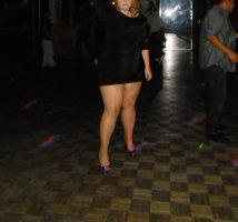married redhead in my 'Hooker Minidress', suntan crotchless hose, no undies and my 'Hooker Hee...JPG