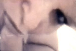 Kim looks at camera while sucking.jpg