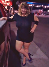 married redhead in my minidress, suntan crotchless hose, no bra and my 'hooker heels' at a tru...jpg