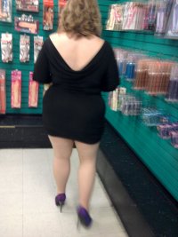 married redhead in my black minidress, suntan crotchless pantyhose and my 'hooker heels' at th...jpg