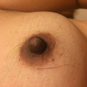 Her hairy nipple to suck
