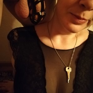 Wife posing with cage key