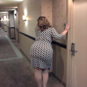 married redhead in wrap dress, pantyhose and heels at the hotel waiting on my bull