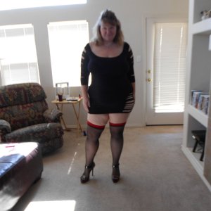 married redhead in minidress stockings and heels waiting on my bull