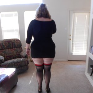 married redhead in minidress stockings and heels waiting on my date with my bull