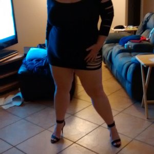 married redhead minidress and heels
