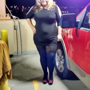 married redhead minidress and heels