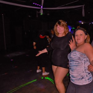 married redhead in minidress, no undies, nude crotchless pantyhose, hooker heels making new friends at dance club