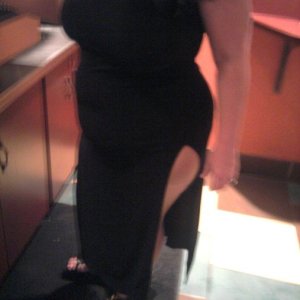 married redhead long black gown pantyhose and heels getting ready for a date to the casino with my bull