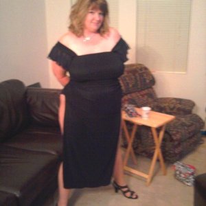 married redhead long black gown pantyhose and heels getting ready for a date to the casino with my bull