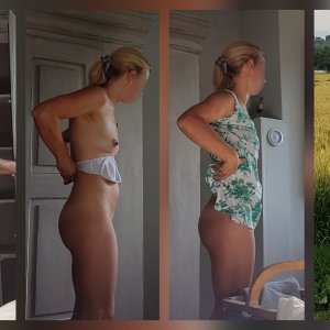 My wife putting on a dress