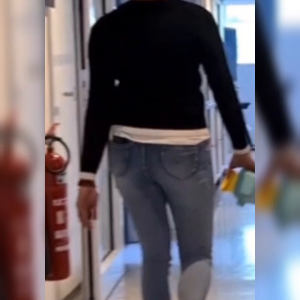 Young colleague shaking her cute little ass