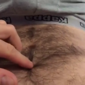 Pulling hard cock from boxers
