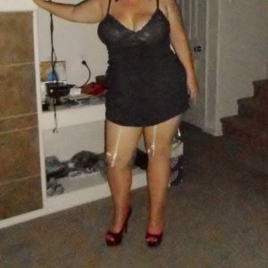 married redhead in my gray nightie with white garters and stockings and my 'Hooker Heels'