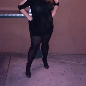 married redhead in my black minidress, black tights and my 'stripper heels'